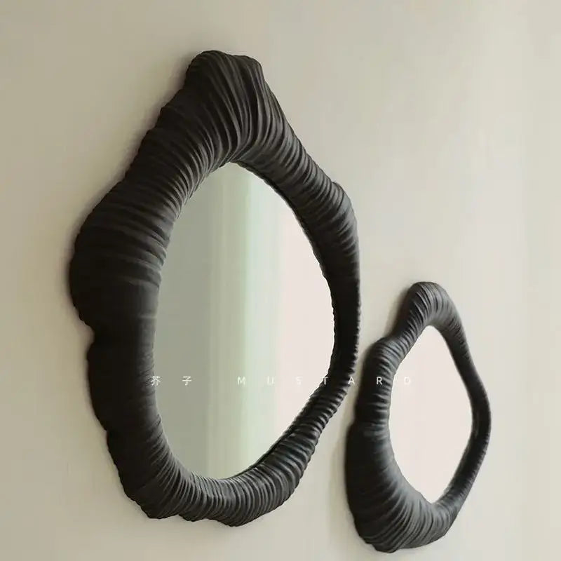 Black textured mirror frame with ruched organic design from decorbites french luxury oval bathroom mirror collection