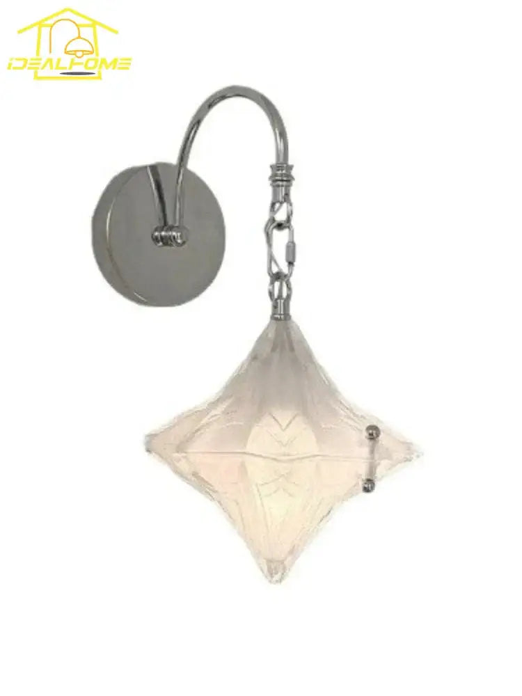 Chrome finished french medieval bauhaus wall lamp with diamond frosted glass shade suspended by ornate chain for living room