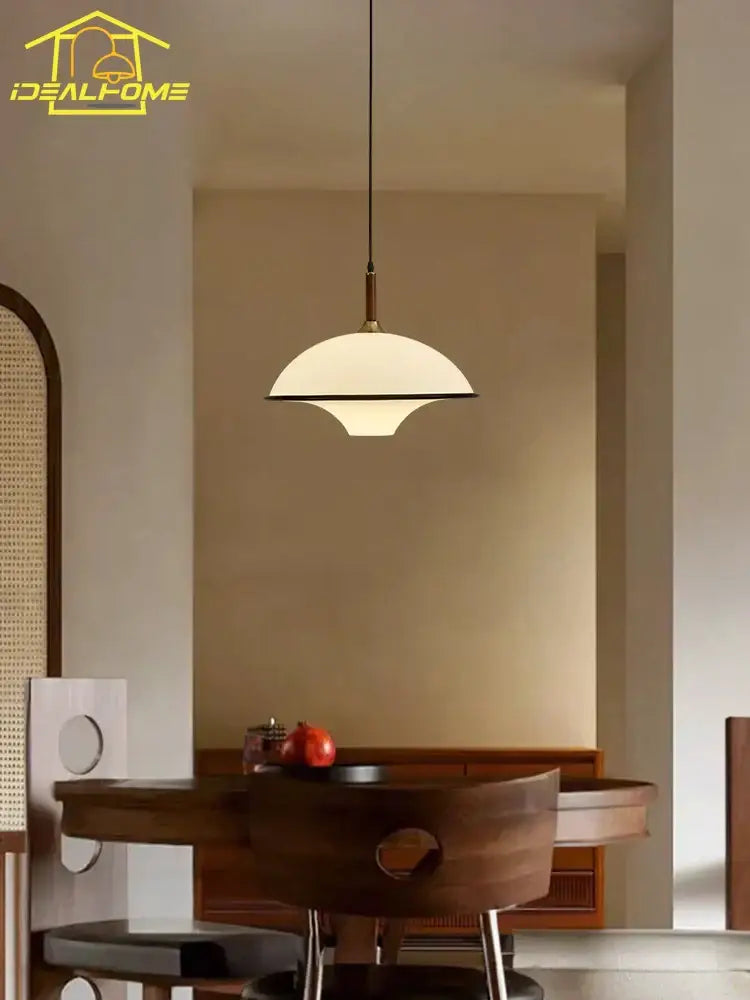 Modern pendant light with dome-shaped frosted glass shade and brass fixture for decorbites french medieval saucer lighting