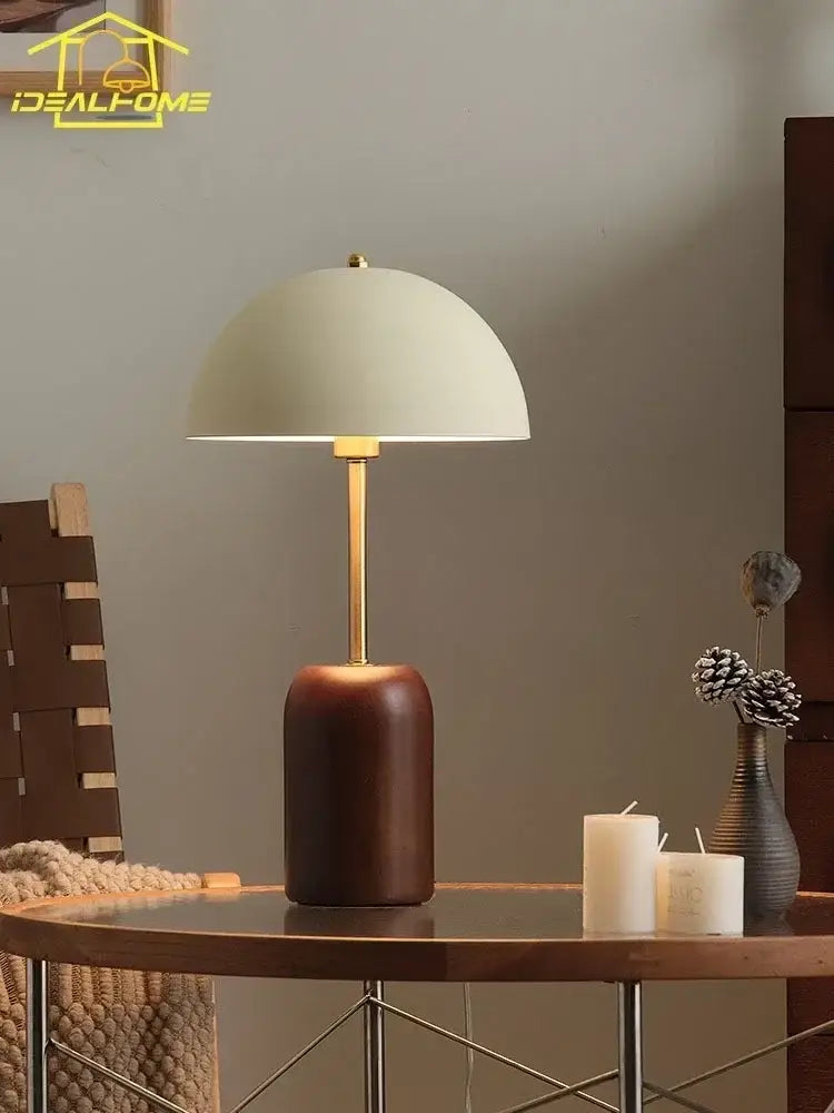 Cream-colored dome-shaped french medieval solid wood table lamp with brass stem and dark wood base for bedroom decorbites french medieval