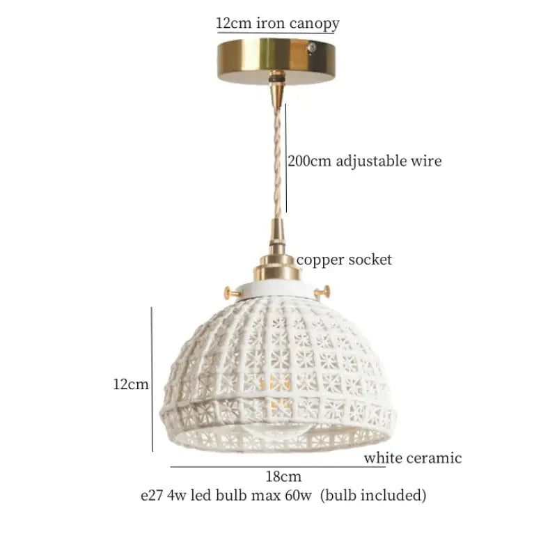 White ceramic pendant light with delicate pattern and brass accents for decorbites french minimalism ceramic dining room