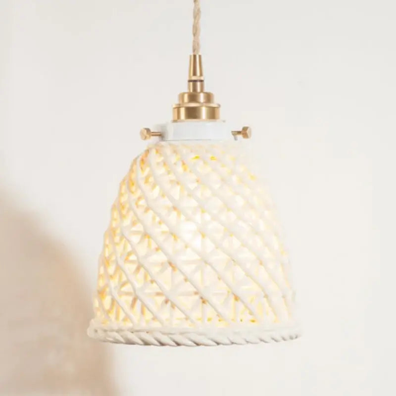 White woven ceramic pendant light with geometric lattice and brass hardware for decorbites french minimalism dining room