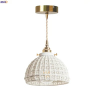 White ceramic pendant light with gold-toned metal accents and woven cord for decorbites french minimalism ceramic dining room