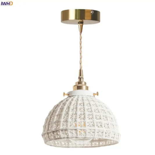 White ceramic pendant light with gold-toned metal accents and woven cord for decorbites french minimalism ceramic dining room