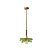 Green leaf-shaped glass pendant lamp with brass and wood accents for dining room decorbites copper wood glass lighting