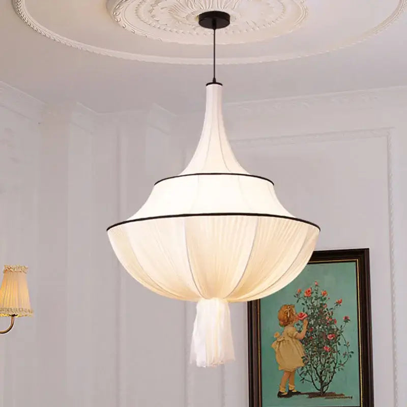 Elegant off-white tiered pendant lamp with black trim and flowing silk shade for living room decorbites french minimalist