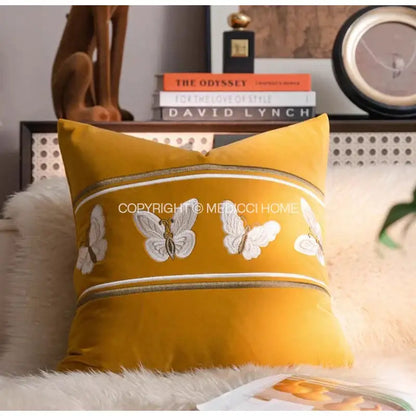 Mustard yellow velvet french night throw pillow with white embroidered butterflies and silver trim for black and white decorbites french night decor