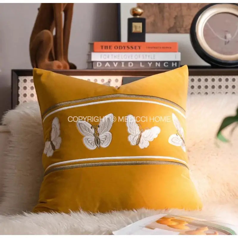 Mustard yellow velvet french night throw pillow with white embroidered butterflies and silver trim for black and white decorbites french night decor