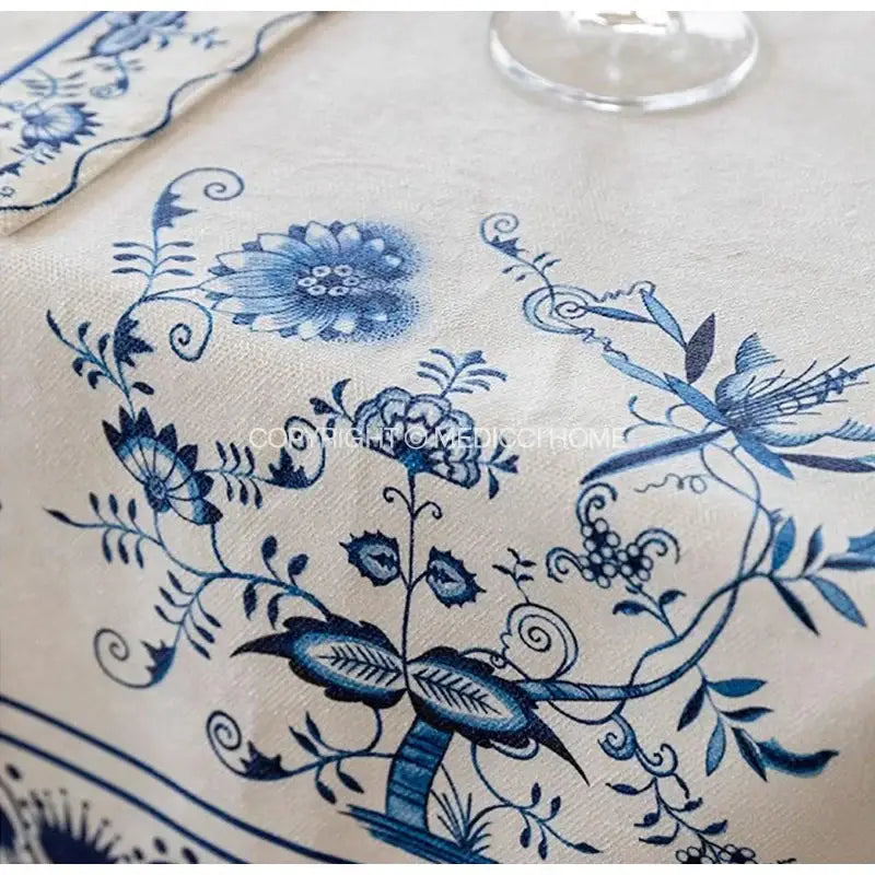 Beige tablecloth with intricate decorbites blue onion floral and vine print for elegant dining room decor