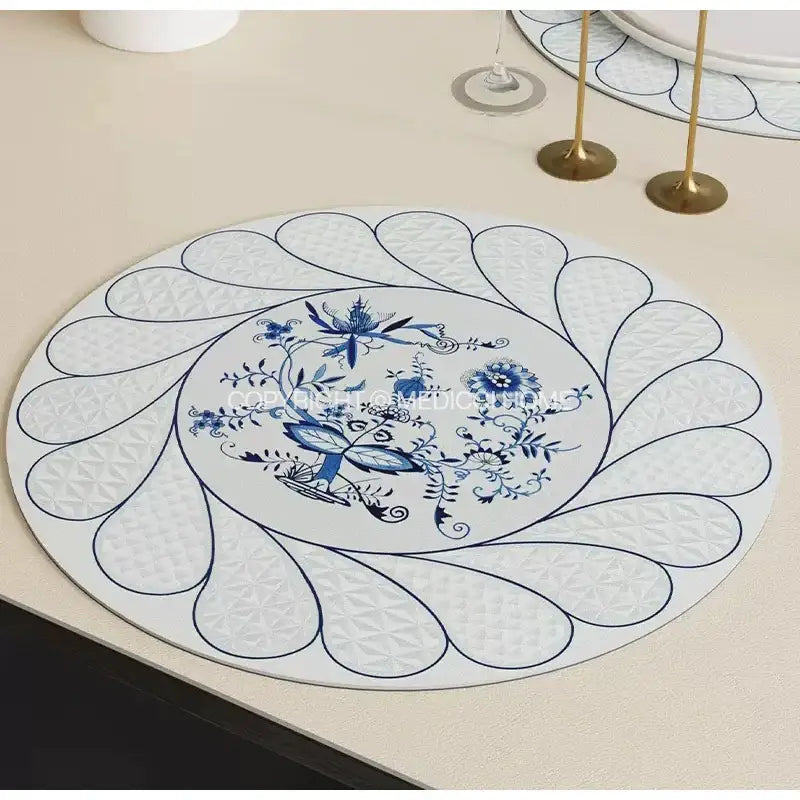 White ceramic placemat with blue onion print and intricate floral patterns for french pastoral dining room decorbites decorbites blue onion