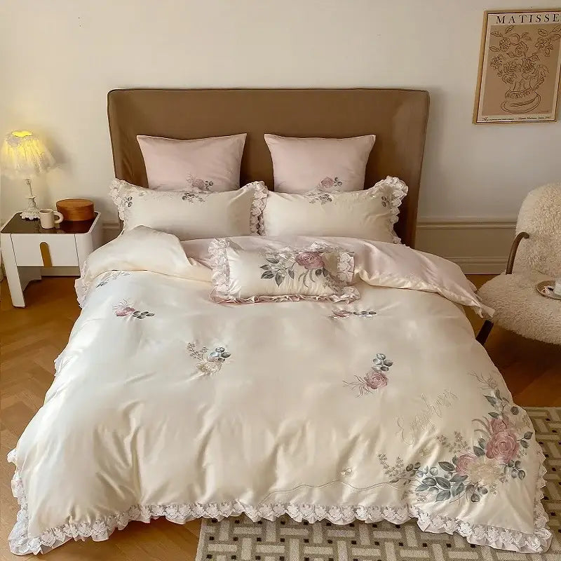 Cream-colored satin bedding set with delicate floral embroidery and lace trim decorbites french princess 1000tc