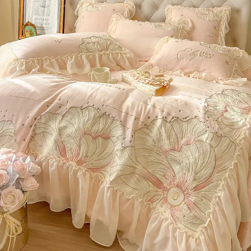 A delicate blush pink bedding set with embroidered floral patterns and lace trim from decorbites french princess collection
