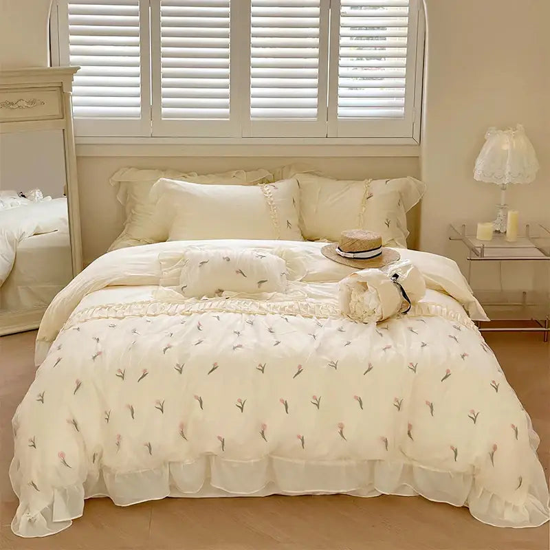 Cream-colored French princess floral bedding set with lace ruffles and delicate embroidery for elegant decorbites decor