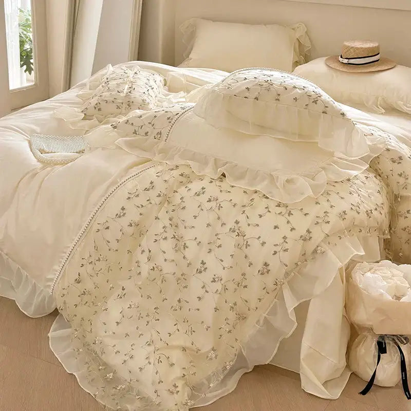 Cream-colored decorbites french princess bedding set with delicate floral embroidery and layered ruffles for bedroom decor