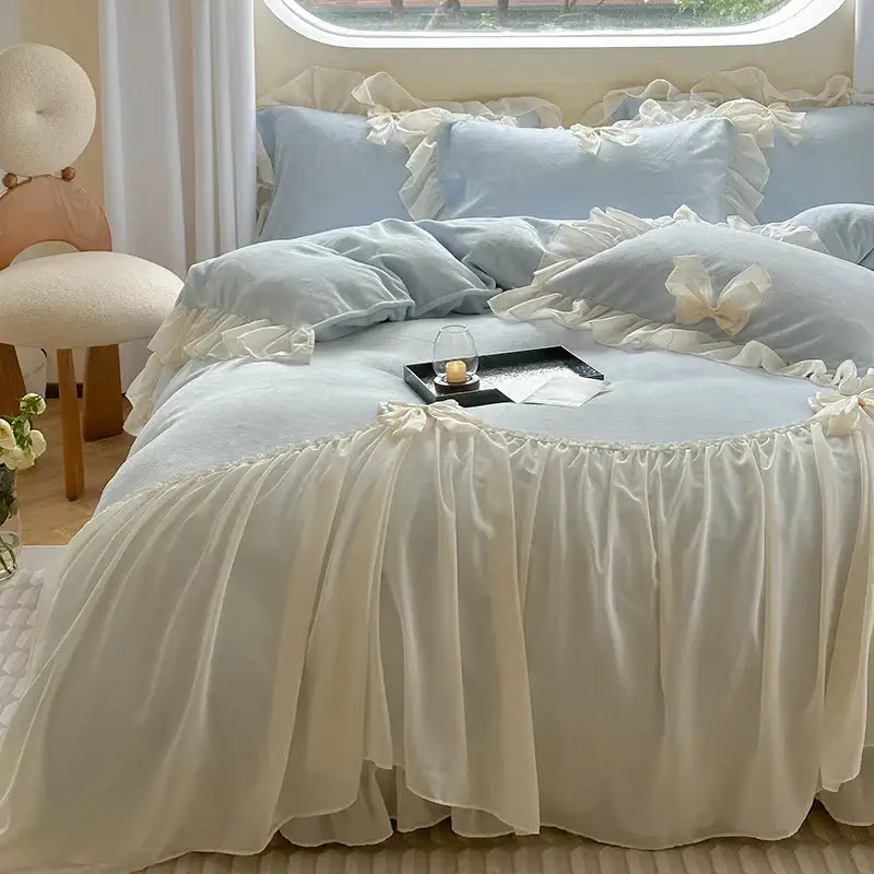 Cream-colored ruffled bed skirt with layered fabric and bow accents from decorbites french princess lace pink velvet bedding set