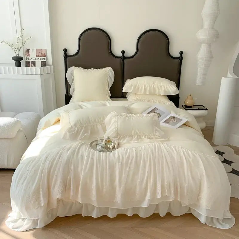 Cream-colored french princess white ruffled lace bedding set with delicate lace detailing and soft flowing fabric