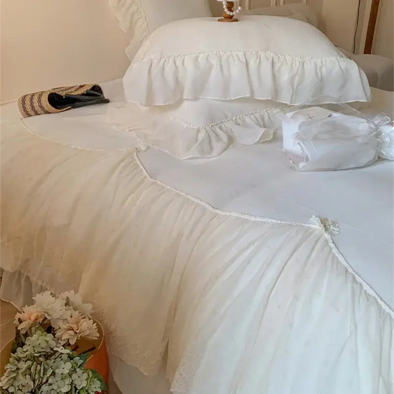 White ruffled bed skirt with layered sheer fabric and lace trim from the decorbites french princess velvet bedding set