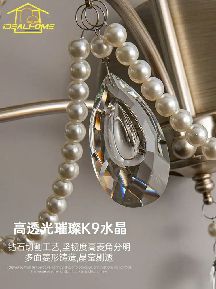 A french retro wall lamp with teardrop clear k9 crystal pendant and pearl beads for decorbites french retro lighting