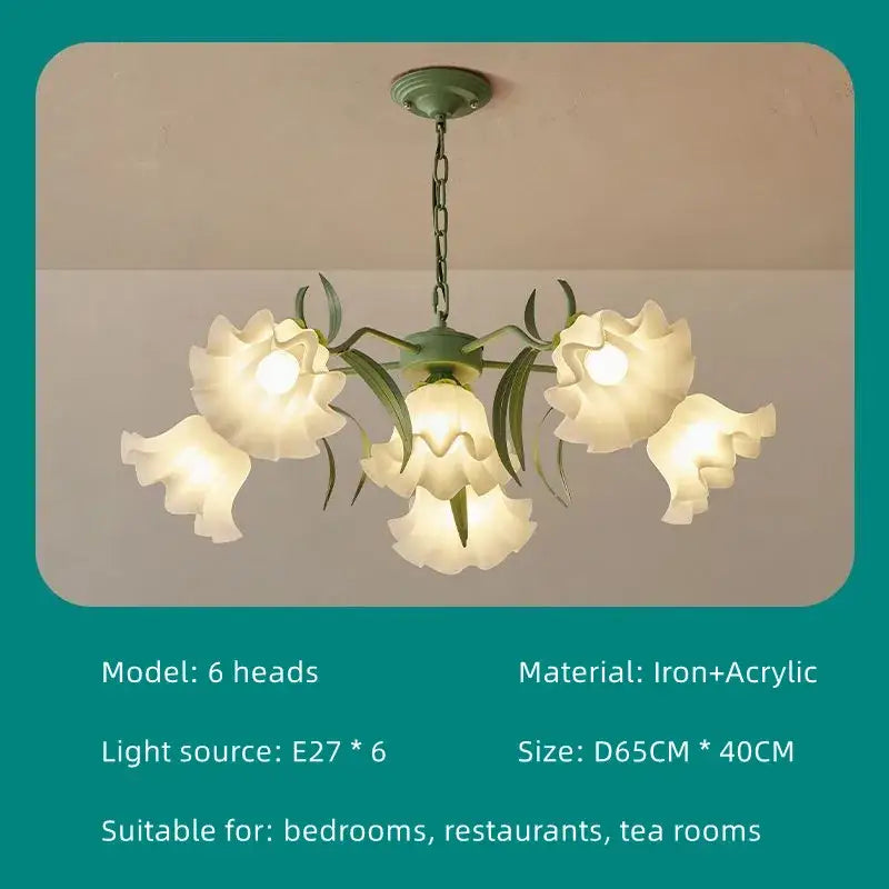A six-head decorbites french retro led flower chandelier with pale cream acrylic shades and dark green iron stems
