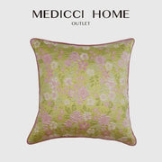 A light green square decorbites contessa camellia throw pillow with delicate pink white floral embroidery for living room decor