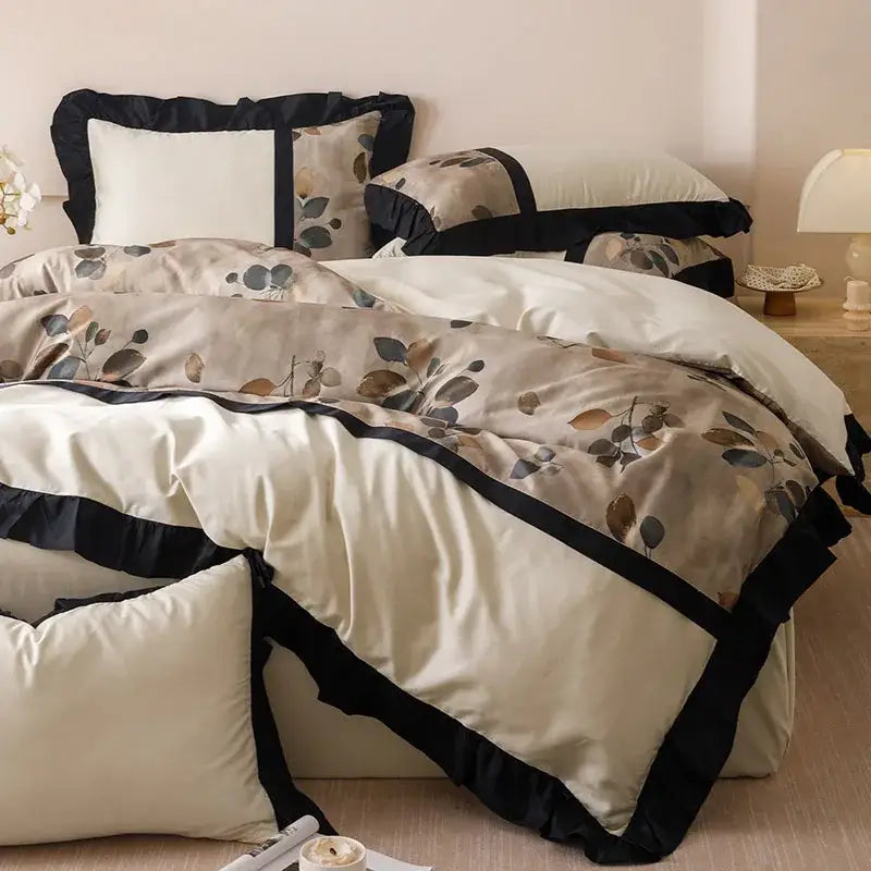 Cream-colored french retro rayon bedding set with subtle leaf pattern and black ruffled trim for bedroom decorbites french retro