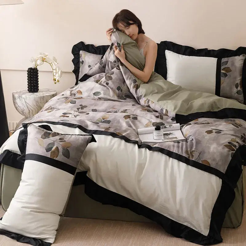 Elegant sage green and black ruffled duvet bedding set with subtle leaf pattern made of french retro rayon by decorbites