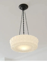 Cream-colored textured glass pendant light with black metal chain in french retro shanghai style dining room decorbites french retro