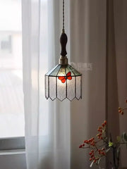 A french retro stained glass decorbites butterfly chandelier with orange butterfly motif and dark wooden handle