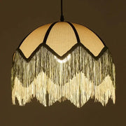 A warm-toned french retro style woven fabric fringed pendant lamp with cascading tassels for retro style bedroom decorbites french retro