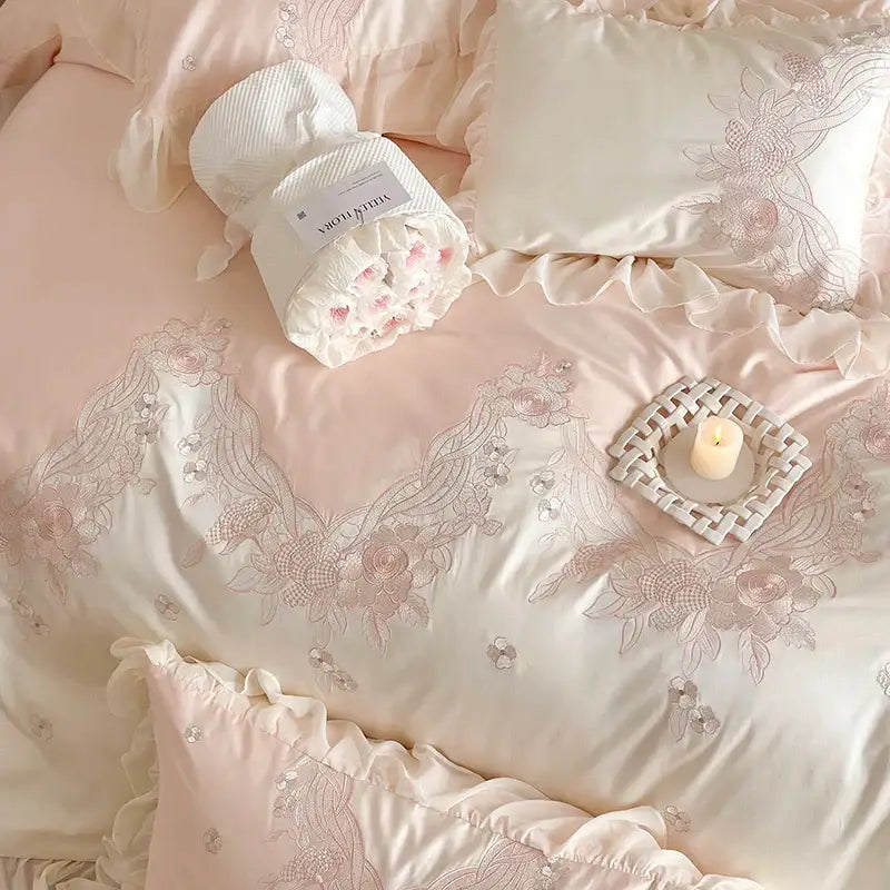 Pastel pink satin bedding set with delicate floral embroidery and lace ruffles for decorbites french romantic decor