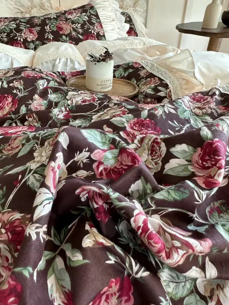 A plush dark brown floral duvet cover with vibrant pink and white roses in a decorbites French rose bedding set