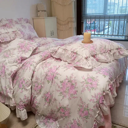 Pink floral ruffled cotton bedding set with french rose flowers print and soft vintage-inspired design for bedroom