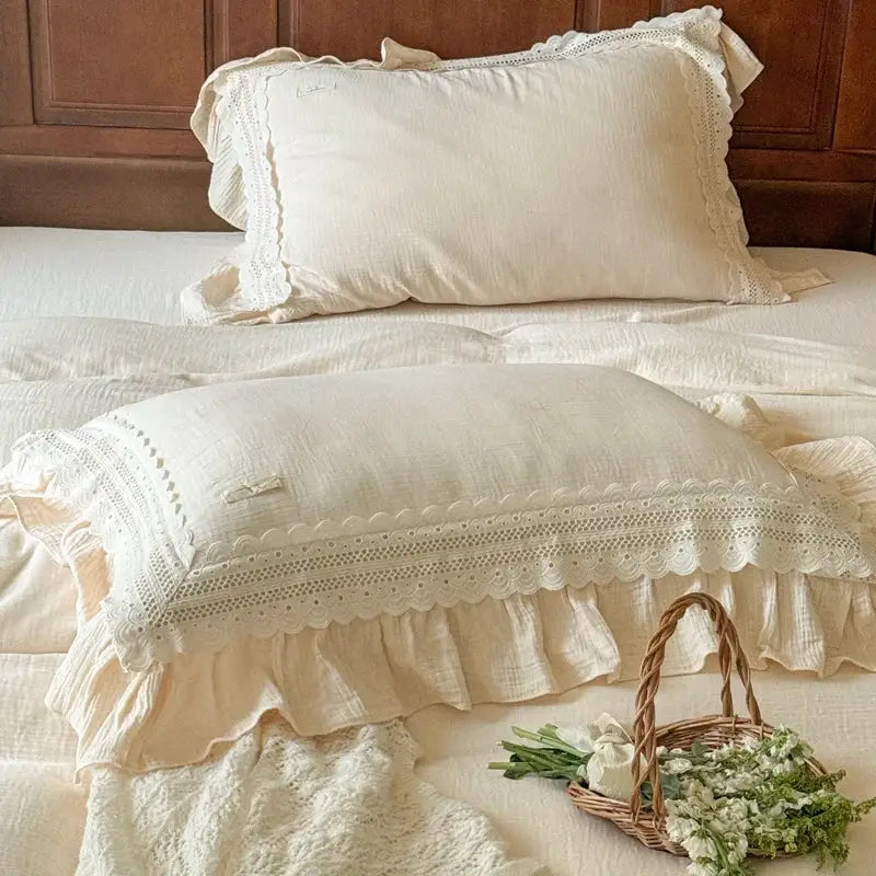Cream-colored french ruffles cotton pillowcases with delicate lace trim in decorbites french ruffles bedding set