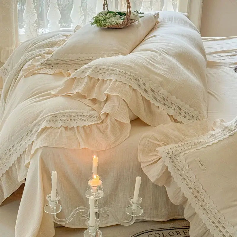 Cream-colored linen bedding set with delicate lace trim and ruffled edges from decorbites french ruffles cotton collection