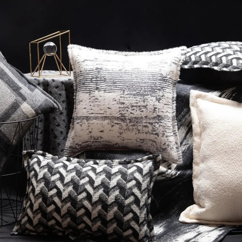 Textured black and white throw pillow with distressed horizontal stripe pattern for decorbites french style decor