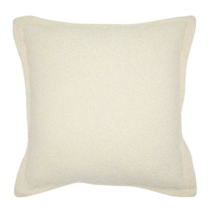 Cream-colored square throw pillow with soft textured fabric finish for french style decorbites french style living room decor