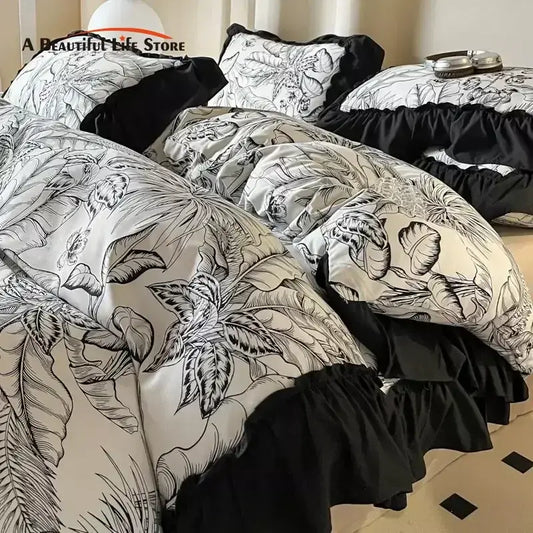 Black and cream french vintage duvet cover set with intricate botanical sketches and ruffled edges for bedroom bedding