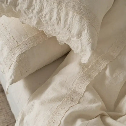 Cream-colored linen pillowcases with delicate eyelet lace trim from french vintage cream cotton linen bedding set decorbites cotton linen