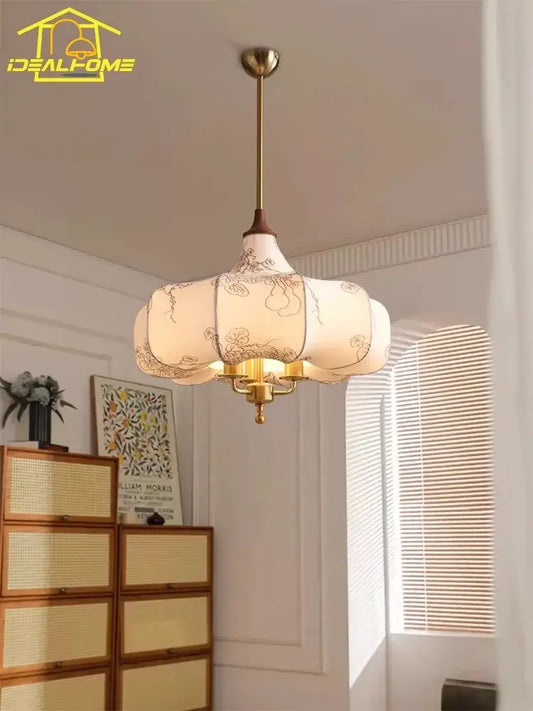 A cream floral fabric pendant light with intricate embroidery and brass frame for french vintage bedroom decorbites pendant lights