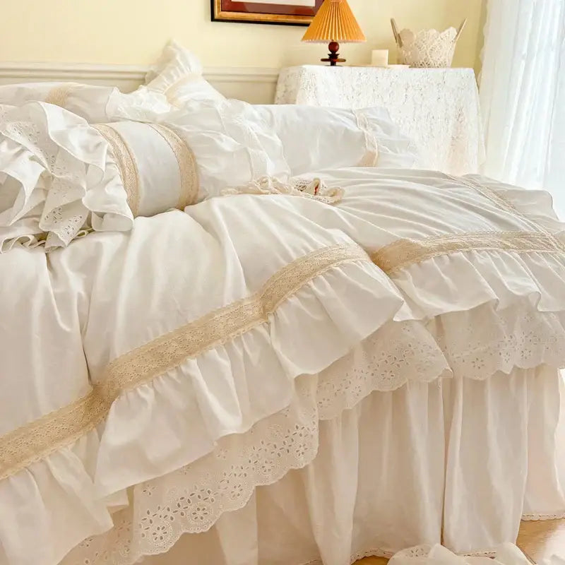 Cream-colored french vintage ruffles bedding set with delicate lace trim and layered cotton fabric by decorbites french vintage
