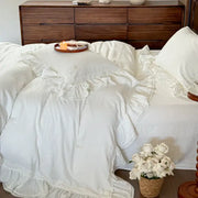 White ruffled cotton bedding set with delicate lace trim featuring double layer crinkle yarn for a vintage bedroom