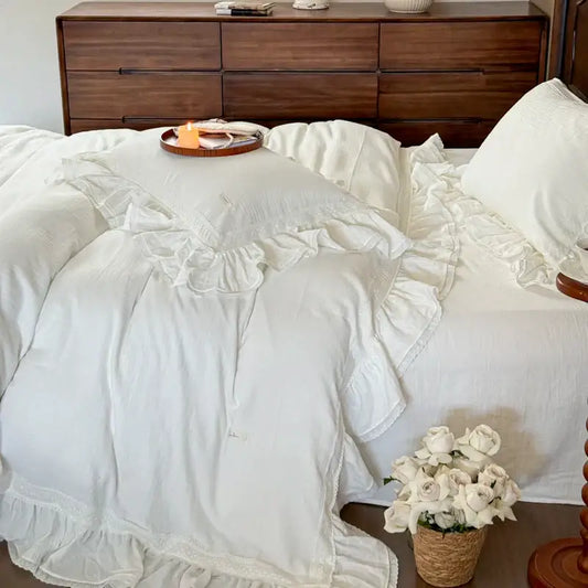 White ruffled cotton bedding set with delicate lace trim featuring double layer crinkle yarn for a vintage bedroom