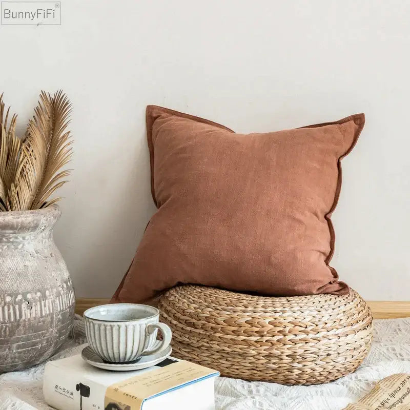 Fringed earth tone linen pillow cover with subtle texture and stitched edges for living room decor by decorbites linen