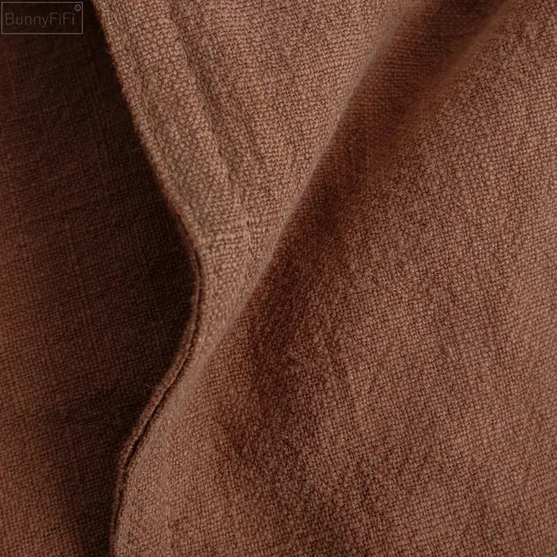 Fringed earth tone pillow cover made of soft brown decorbites linen fabric with textured weave for living room decor