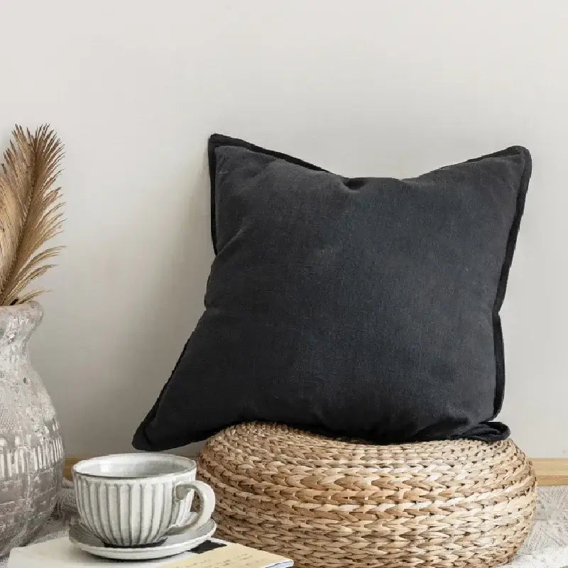 Black linen pillow cover with subtle texture and contrasting black piping for elegant decorbites linen pillow decor