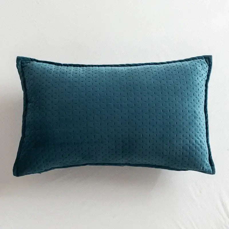 Teal velvet rectangular fringed velvet cushion cover with subtle quilted pattern and stitched edges for living room decorbites