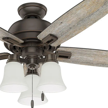 This hunter ceiling fan features five rustic wood blades and three frosted glass bell shades by decorbites
