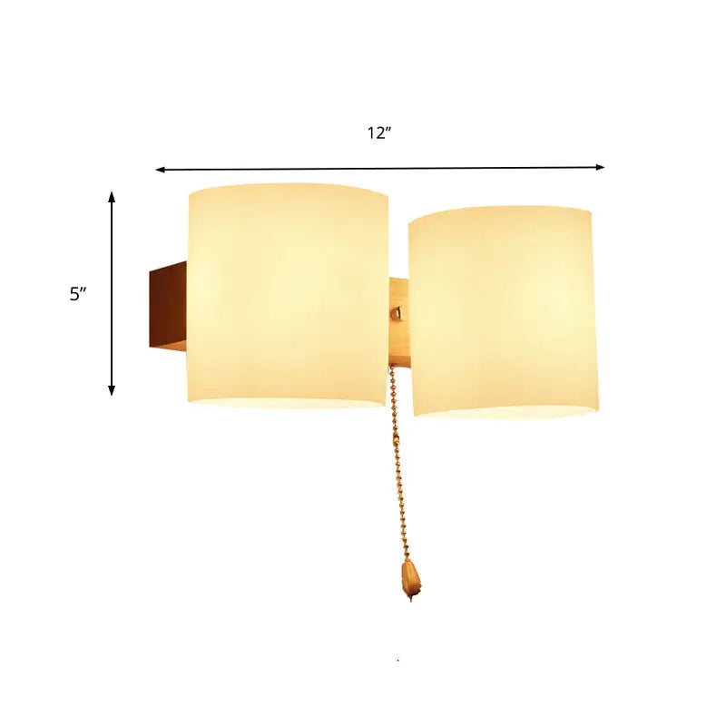Frosted glass copper wall lamp with warm-toned brass chain and pull switch for bedroom wall lighting direct wired electric