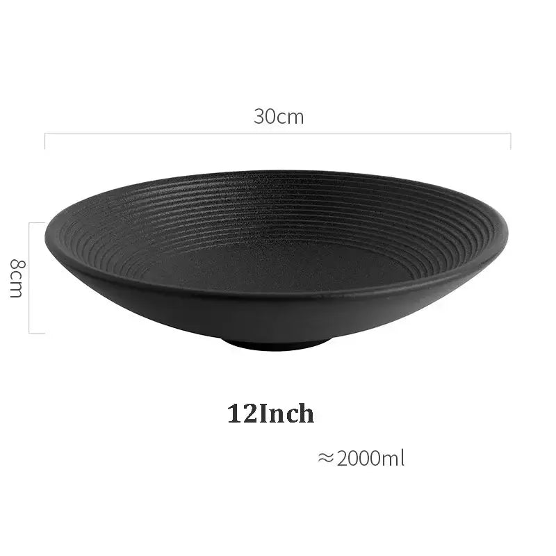 Black ceramic bowl with concentric ridged texture 30cm wide 8cm deep part of decorbites frosted glaze ceramic set