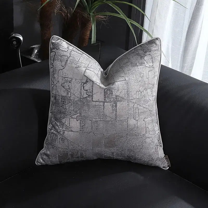Silver-toned square pillow cover with textured abstract geometric pattern and subtle sheen by decorbites frosted gold satin